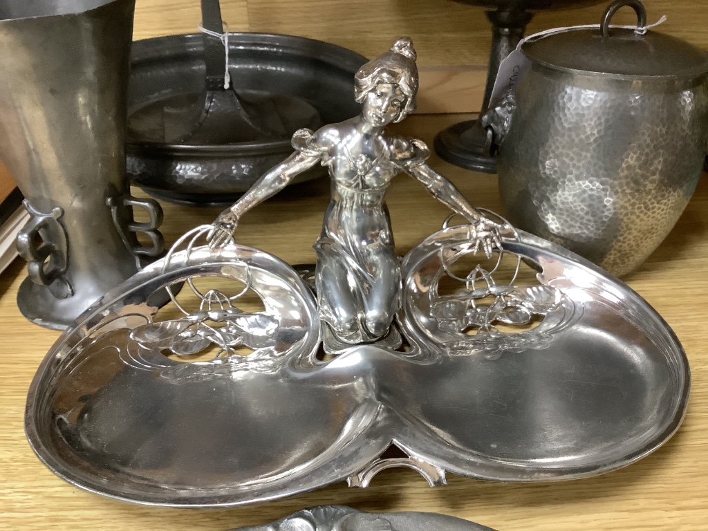 Tudric pewter wares - a Rose Bowl, a comport, a jar and cover, a vase and a three-piece cruet set and other Arts and Crafts and Art Nouveau pewter wares